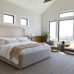 The primary bedroom suite overlooking the golf course and the KC Skyline on Lot 8 in Eagle Pointe Preserve